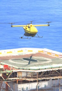 Helicopter is landing on an oil rig